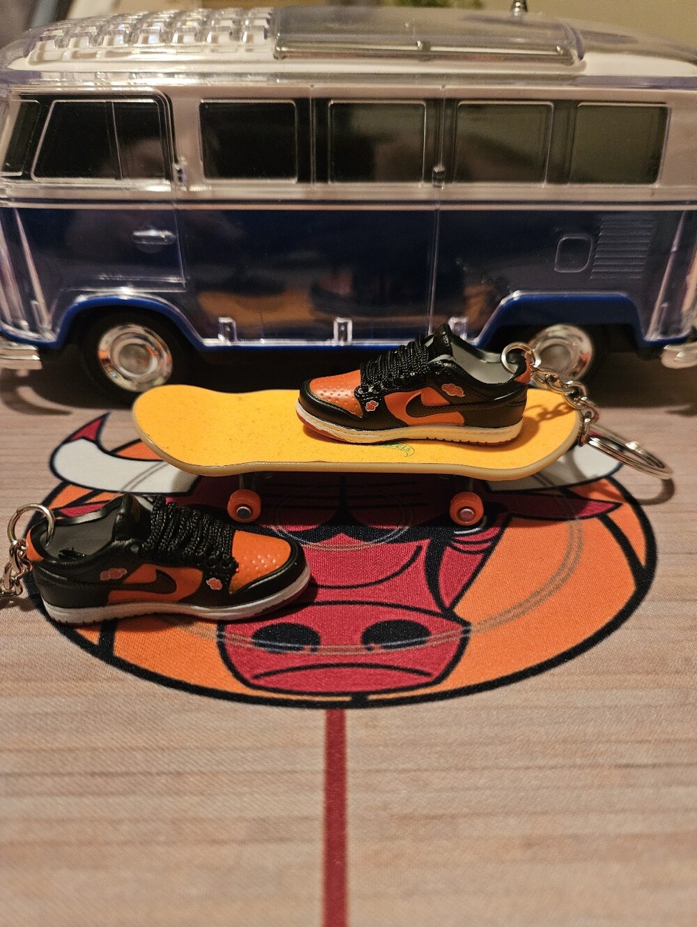 Pair of Mini sneaker keychain.